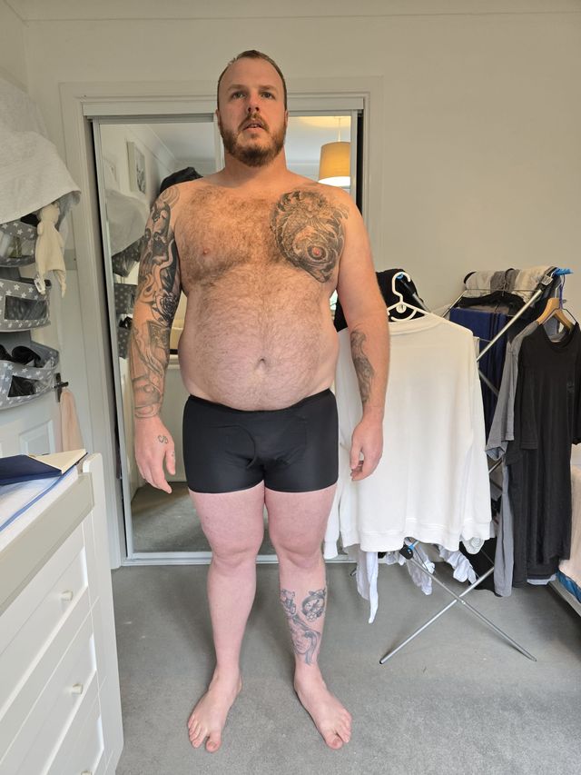 Andrew East at 150 kilograms, standing front on